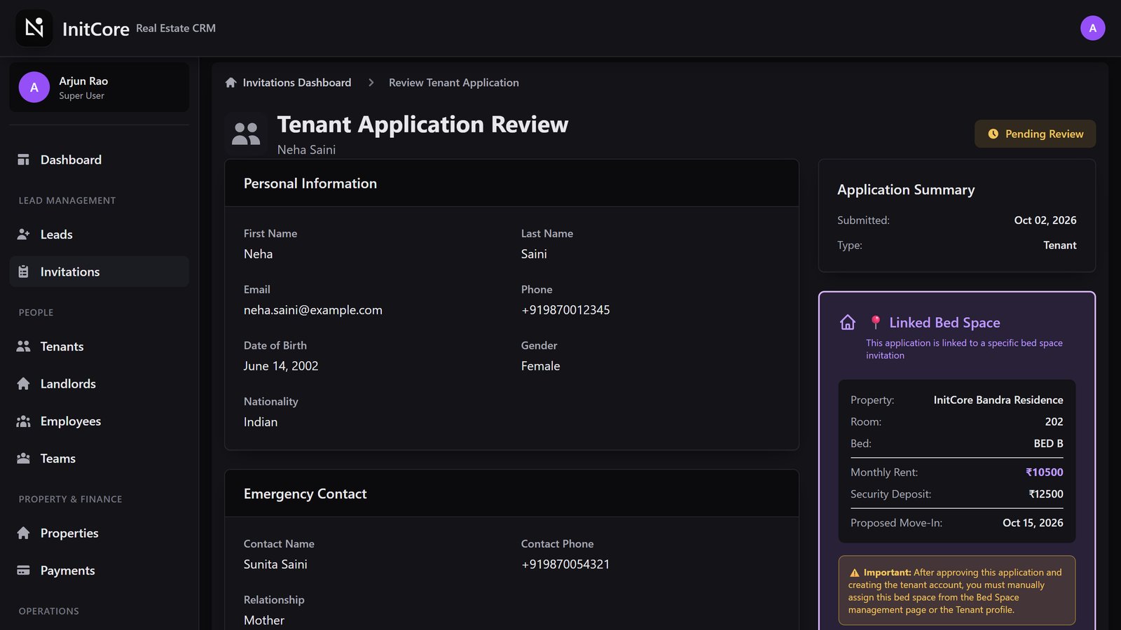 Reviewing a tenant application next to the linked bed